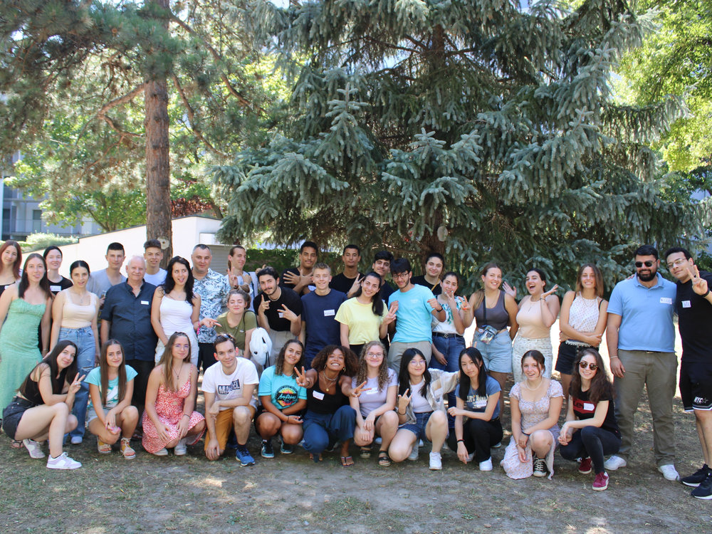 Group photo of a youth exchange outdoors in Vienna