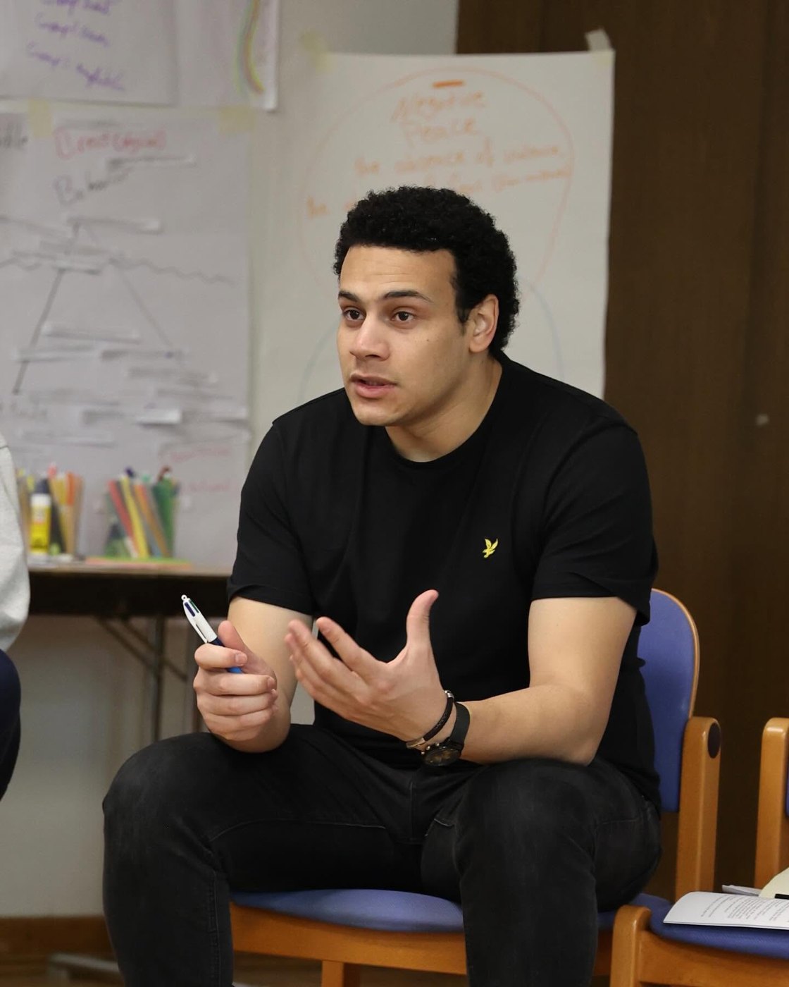 Sakr in discussion during a training session
