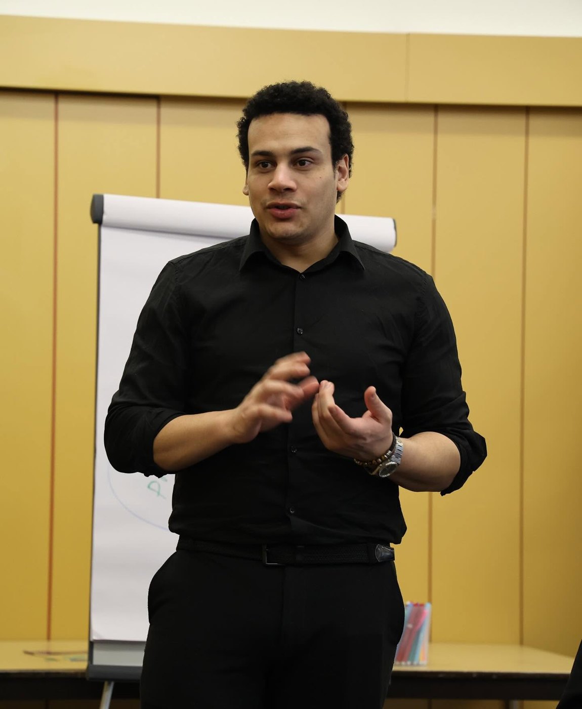 Sakr speaking at a training